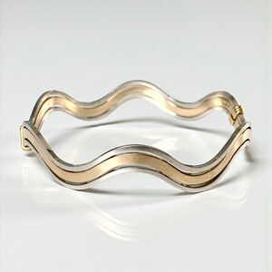 Vintage Avon Wavy Goldtone Silvertone Bangle Bracelet. Two tone.